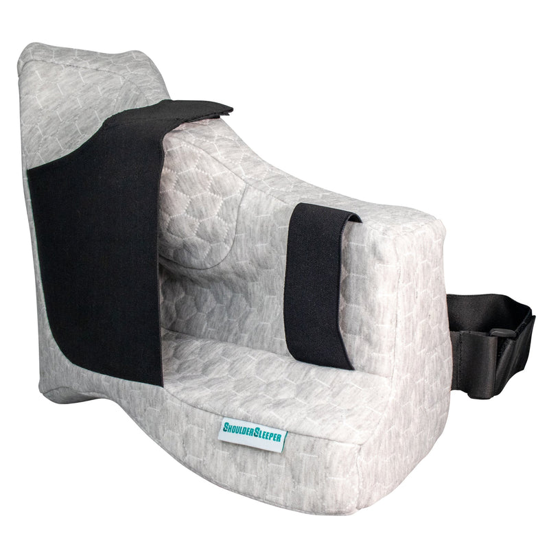 ShoulderSleeper shoulder support pillow with adjustable black straps.